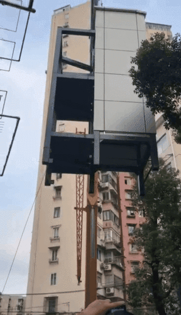 杨浦区加装电梯_成品井道整体吊装技术_室外升降货梯如何制作安装